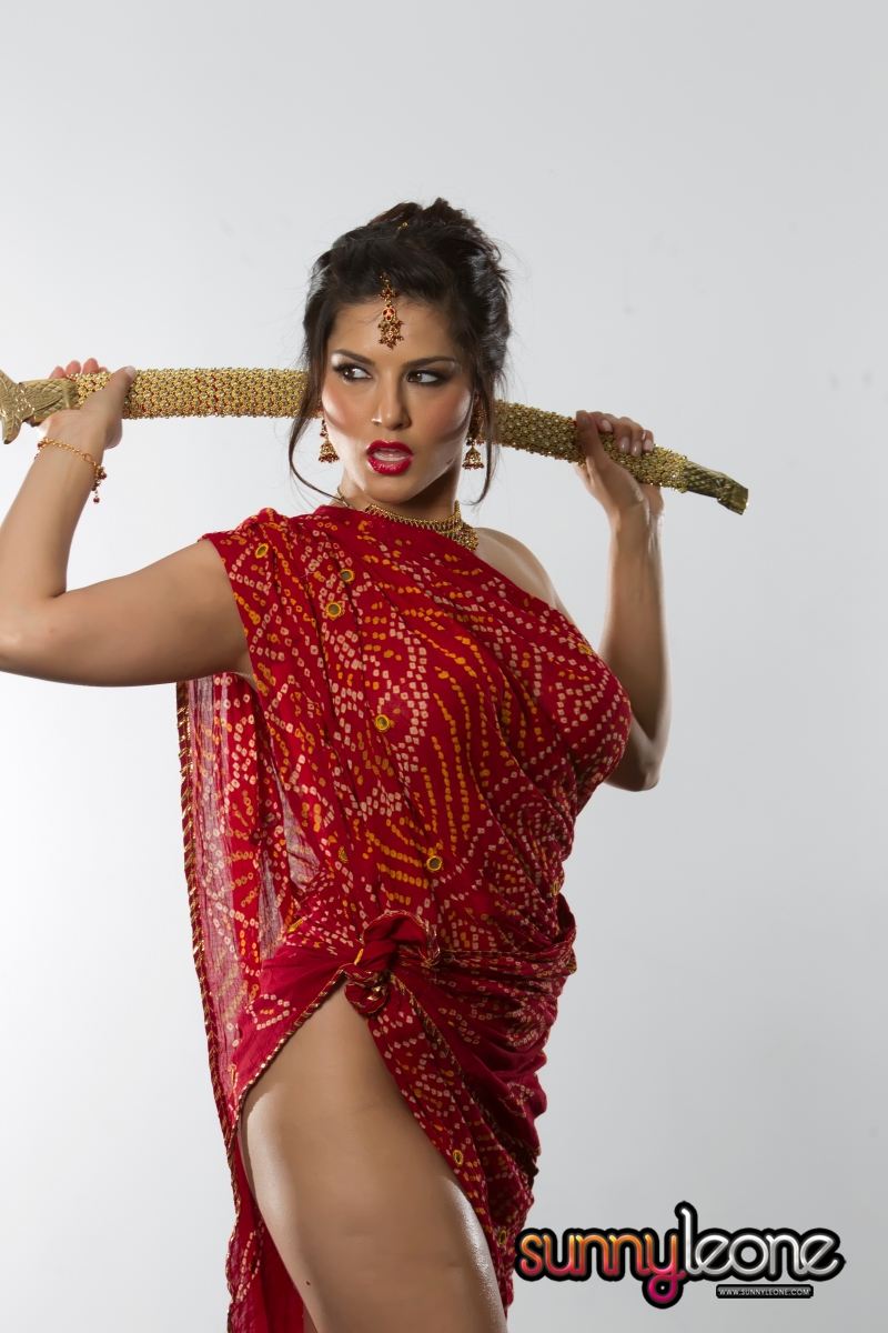Sunny Leone Red Saree Sex - Oiled Up Sunny Leone Teasing With A Big Sword